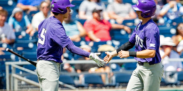 Brayden Taylor celebrates with Anthony Silva