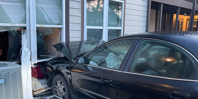 Car crashed into building