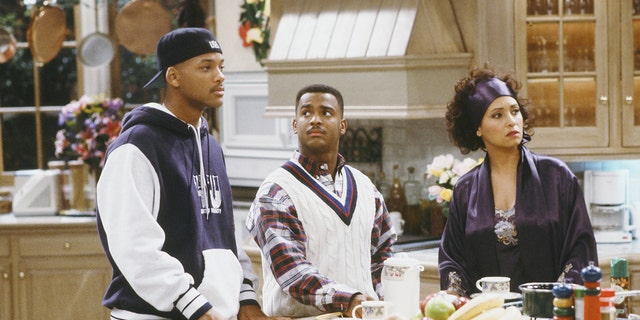 Will Smith and Alfonso Ribeiro stand in the kitchen in Fresh Prince of Bel Air scene