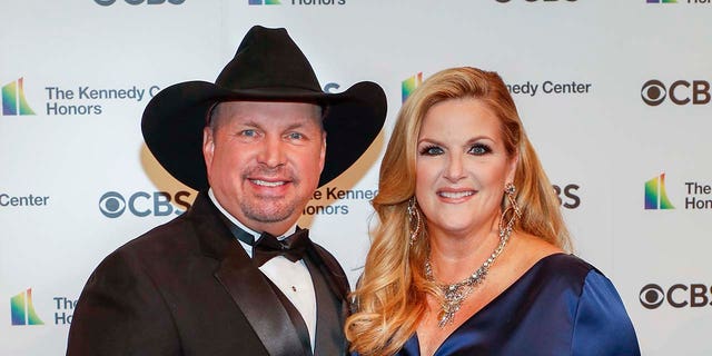 Garth Brooks on the red carpet with Trisha Yearwood