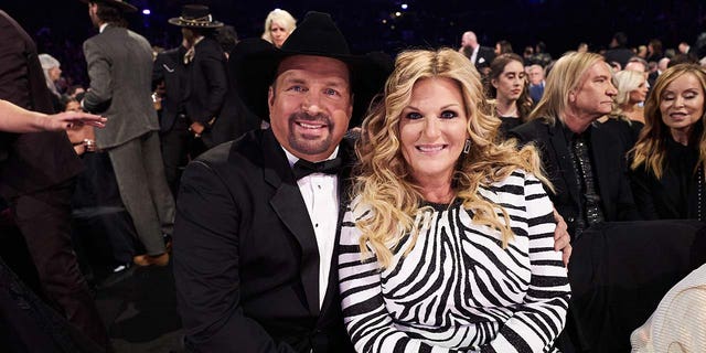 Trisha Yearwood and Garth Brooks at an event