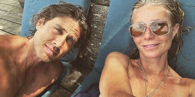 gwyneth sunbathing topless with husband brad falchuk in italy