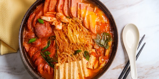 a bowl of Budae-jjigae, a Korean dish that features SPAM