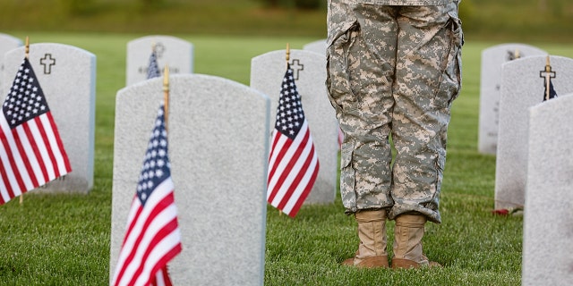 us soldier at cemetery