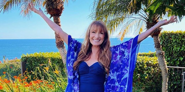 Jane Seymour in a blue bathing suit