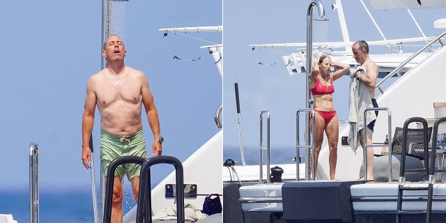 jerry seinfeld showering on yacht jerry smoking a cigar while jessica takes a photo of him