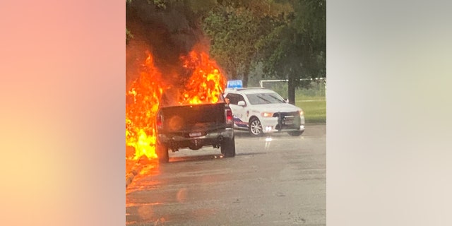 flames engulfing truck