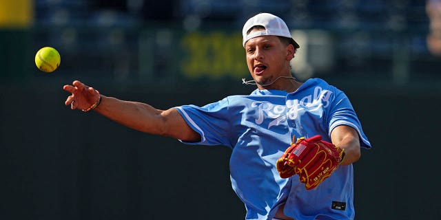 Patrick Mahomes throws a baseball