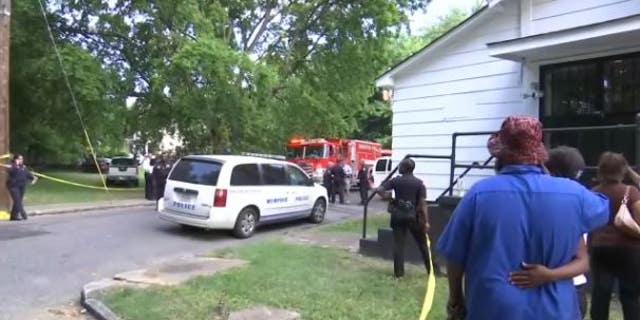 authorities and residents at scene of fire