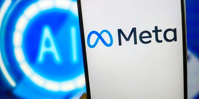 The Meta logo on a phone