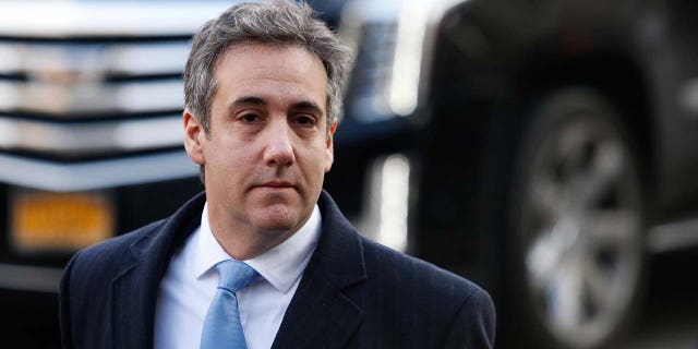 Michael Cohen wearing a suit