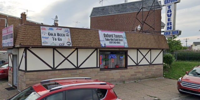 A shabby looking brown bar on a Philadelphia street.