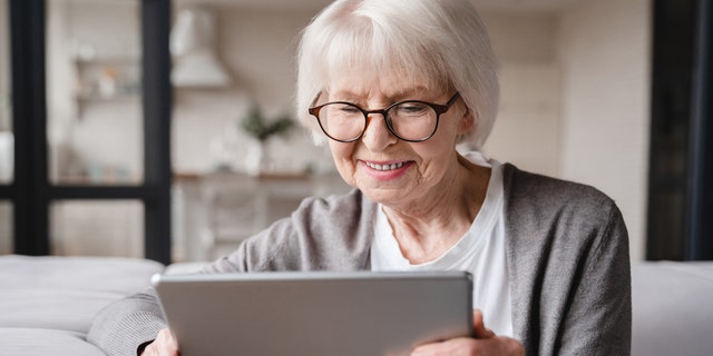 Older woman on tablet