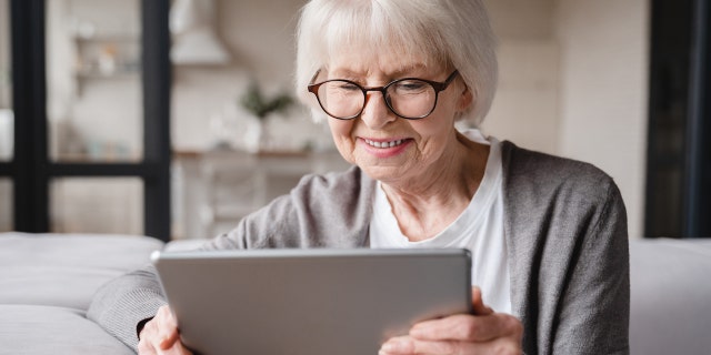 Older woman on tablet