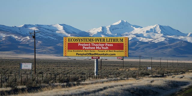 billboard displays "Protect Thacker Pass" 