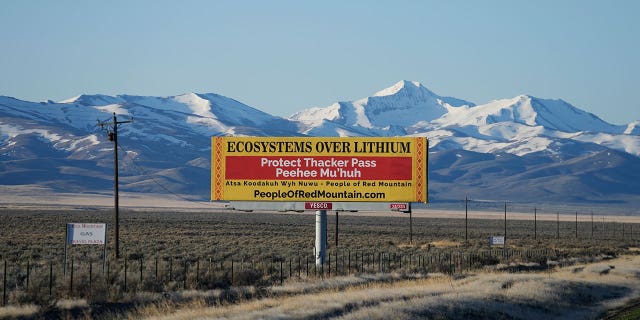 billboard displays "Protect Thacker Pass"