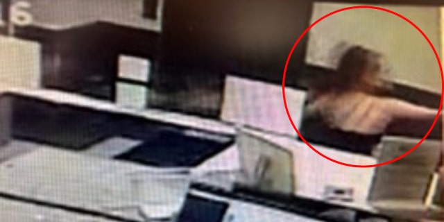 Thrasher apparently pointing a gun at victims