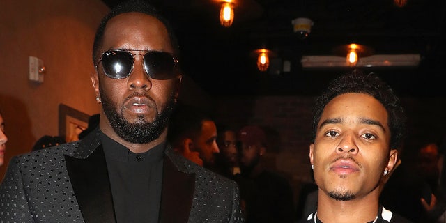 Puff daddy and son Justin Combs wear matching black outfits at Hollywood event