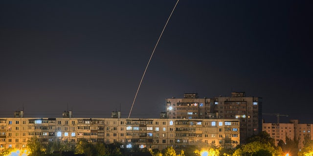 A Russian rocket flies through the sky towards Ukraine