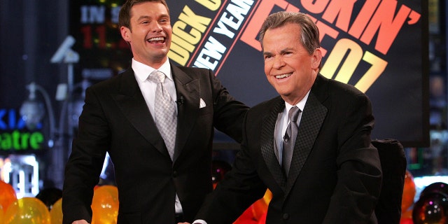 Ryan Seacrest laughs with Dick Clark on annual new Year's Eve broadcast