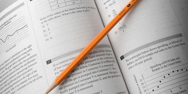 pencil on book