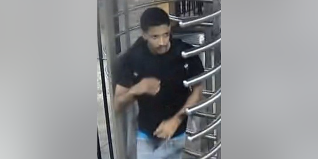 Robbery suspect walking out of subway