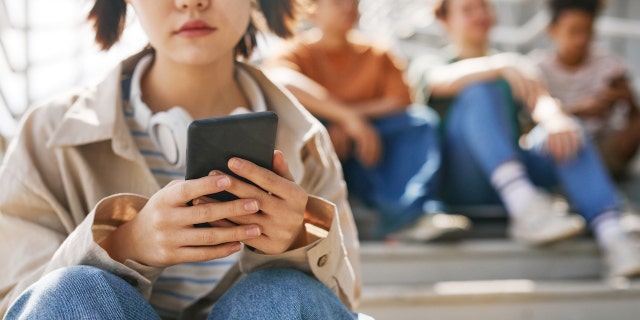 Teen girl on phone