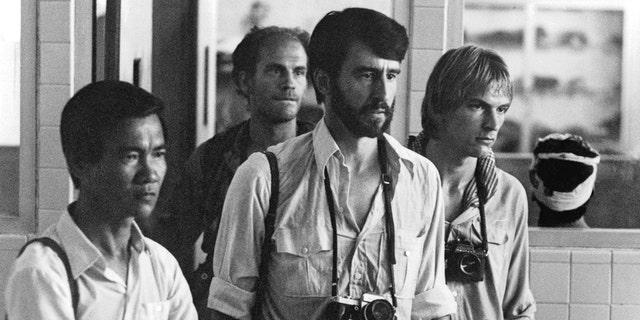 Actors Haing S Ngor, John Malkovich, Sam Waterston and Julian Sands in The Killing Fields 