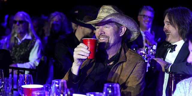 Toby Keith toasts with a red solo cup