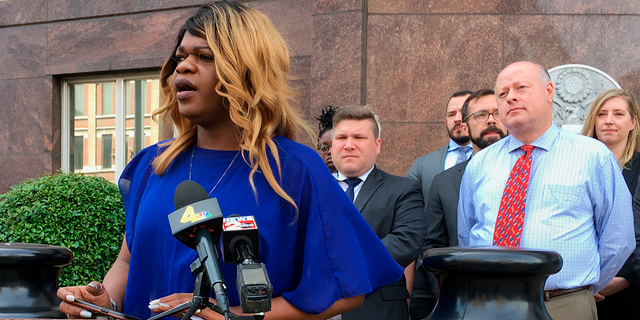 Lead plaintiff talks to crowd outside Tennessee courthouse