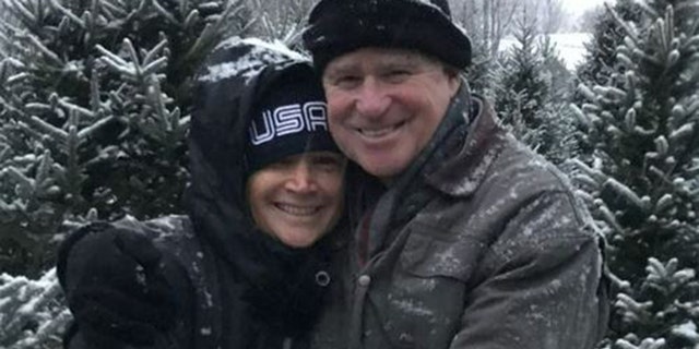 Treat Williams wears hat and winter coat with wife Pam Van Sant
