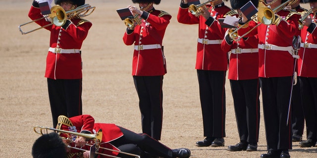 Trombonist on ground