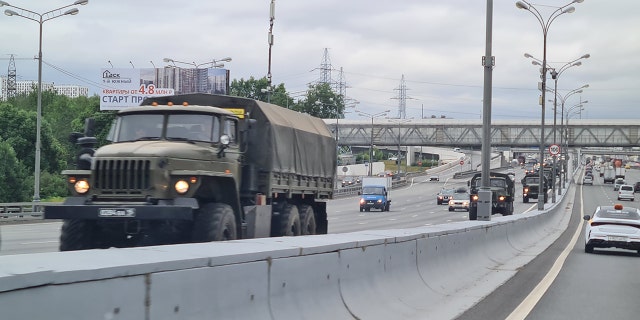 Armored vehicles belonging to the Wagner group travel along the M4 highway towards Moscow