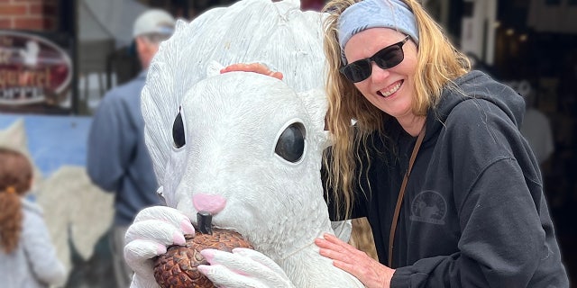 white squirrel and Katy Rosenberg in Brevard, North Carolina