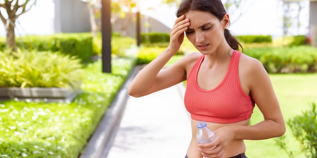 Woman having heat stroke