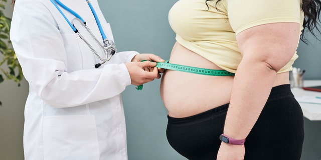 Woman with obesity at doctor