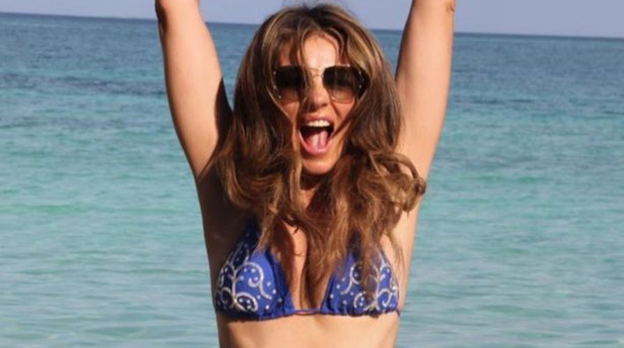 Elizabeth Hurley, 58, is a bombshell in tiny string bikini in jaw-dropping  beach photo
