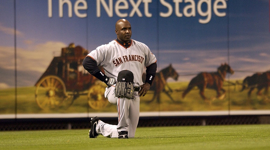 Barry Bonds sports a new look with fancy bicycle, slimmed-down
