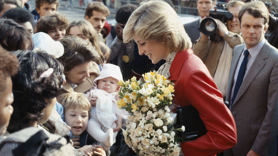 Princess Diana greeting a child