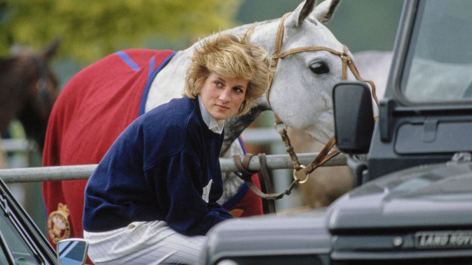 Princess Diana photographed with a white horse