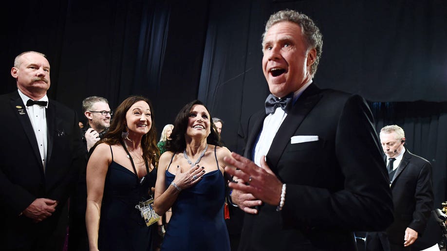 Will Ferrell at an award show in a black tuxedo
