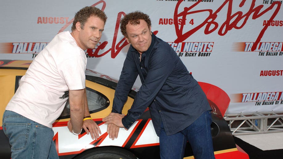 Will Ferrell and John C. Reilly next to a car