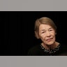 Glenda Jackson close up on black background