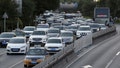 Cars drive on the road during the evening rush hour in Beijing, China, on July 1, 2019.