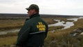 An Eagle Pass Border Patrol agent looks over the Rio Grande scanning the area illegal traffic, February 06, 2003. Hundreds of illegal immigrants attempt to cross the U.S.- Mexican border daily. - Fox News
