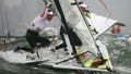 Jonas Warrer and Martin Kirketerp Ibsen of Denmark take to the sea in a spare boat borrowed from the Croatian team as they compete in the 49er class race held at the Qingdao Olympic Sailing Center during day 9 of the Beijing 2008 Olympic Games on August 17, 2008 in Qingdao, China.