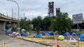 Tents cover an open space near the Steel Bridge in Portland, Oregon on July 7, 2023.