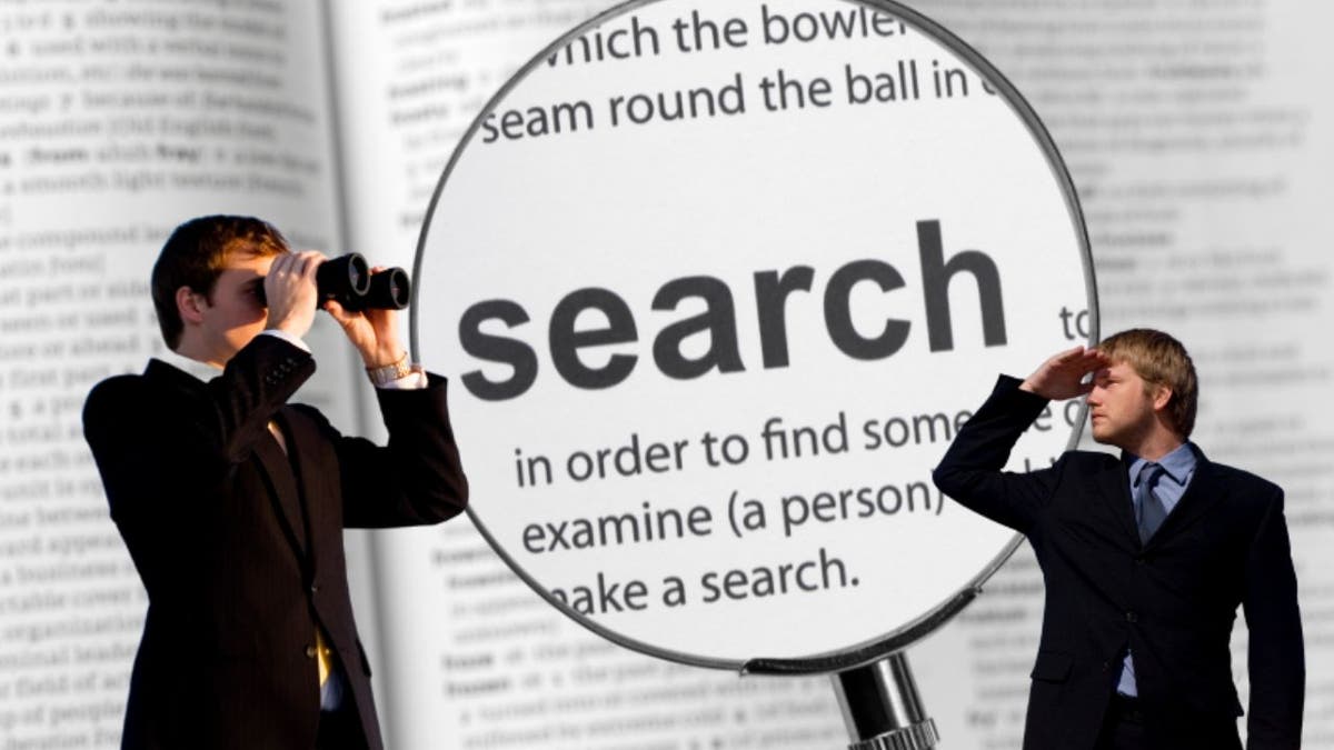 Two men look around with binoculars, magnifying glass over the word "search"