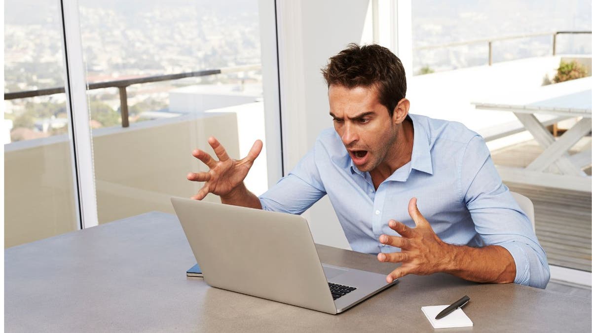 Man yells at computer screen