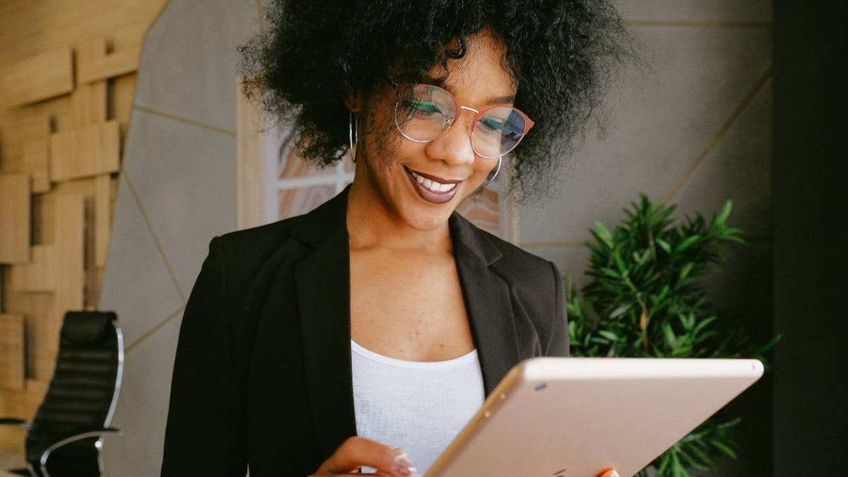 A woman using an iPad